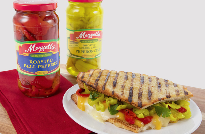 Grown-Up Grilled Cheese Sandwich panini with mezzetta peppers